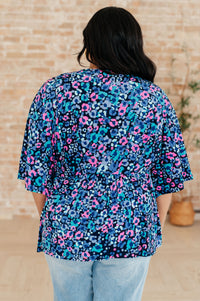 Thumbnail for Dreamer Peplum Top in Navy and Lavender Animal Print