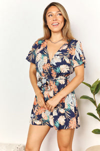 Thumbnail for Botanical Print Surplice Neck Tie Waist Romper