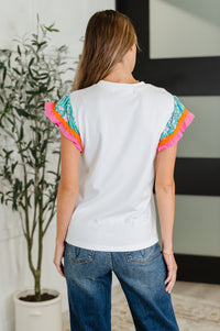 Thumbnail for Petals & Poise Floral Flutter Sleeve Top in White