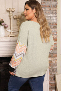 Thumbnail for Plus Size Exposed Seam Print Long Sleeve T-Shirt