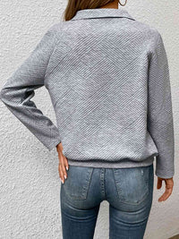 Thumbnail for Half Buttoned Collared Neck Sweatshirt with Pocket