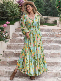 Thumbnail for Printed Tie Neck Long Sleeve Maxi Dress